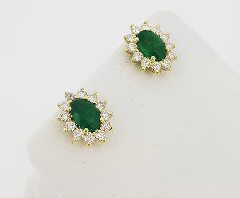 1.37ct Emerald and Diamond Oval Cluster Stud Earrings, in 18ct yellow gold.