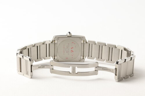 Cartier Tank Francaise Midsize Stainless Steel Wrist Watch, Ref. 2301, white dial, Roman numerals, blue steel hands, sapphire cabochon crown, sapphire crystal, Quartz movement, stainless steel bracelet with double fold clasp, original Cartier sticker on case back.