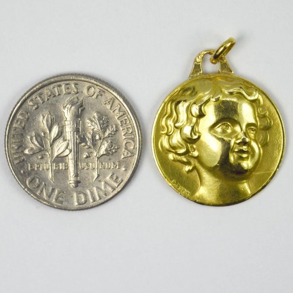 French Cherub 18ct Yellow Gold Charm Pendant; designed as a medal depicting a cherub’s head, Signed P. Turin