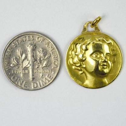 French Cherub 18ct Yellow Gold Charm Pendant; designed as a medal depicting a cherub’s head, Signed P. Turin