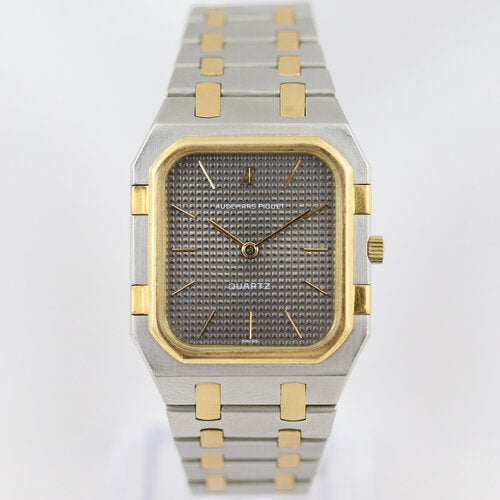 Audemars Piguet Royal Oak Square Steel and Gold 32mm Quartz Watch; gold bezel, silver/grey textured dial, baton hour markers, on a steel and gold bracelet strap with an Audemars Piguet fold-over clasp.