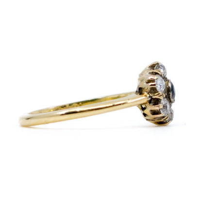 A sapphire and diamond cluster ring in yellow gold