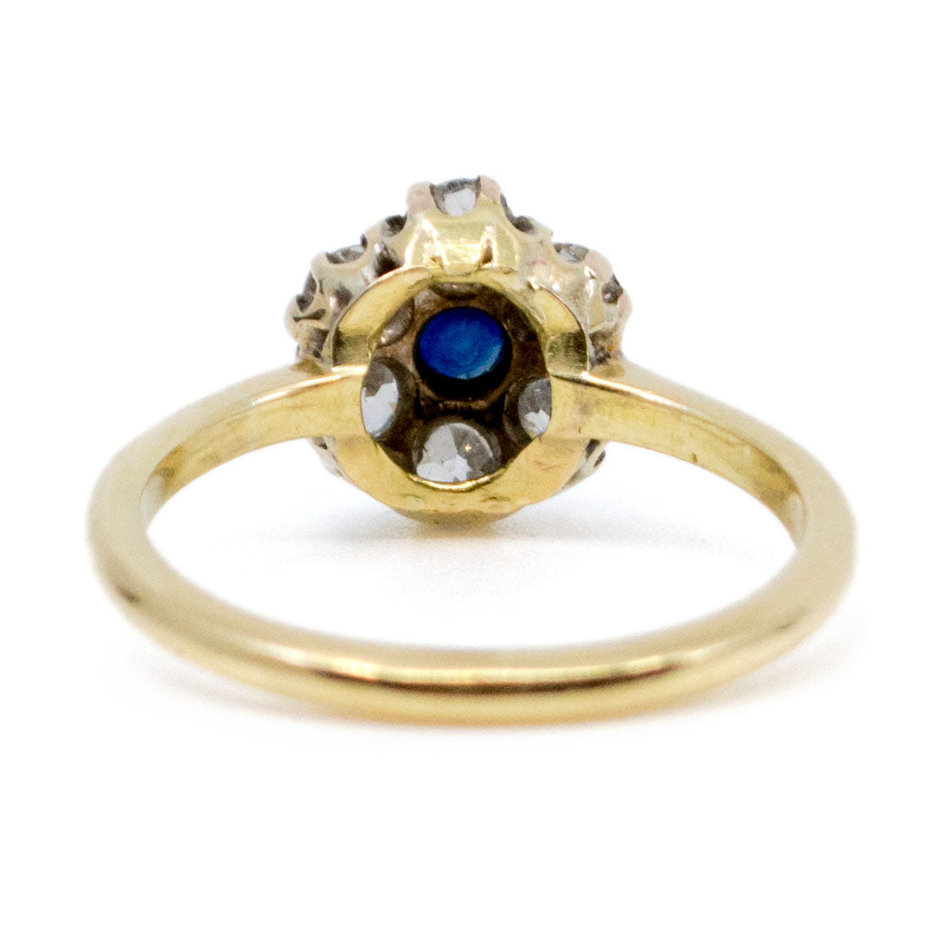 A sapphire and diamond cluster ring in yellow gold