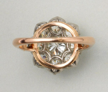 Antique Edwardian Old Cut Diamond Floral Cluster Ring; 18ct yellow gold and platinum cluster ring set with old-cut diamonds, 2.75 carats, France, Circa 1910