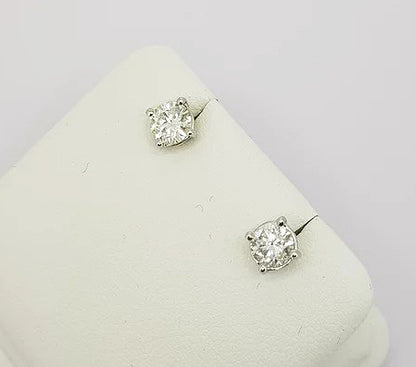 Pair of Diamond Solitaire Stud Earrings, 1.01 carat total, 18ct white gold, colour H, clarity SI1