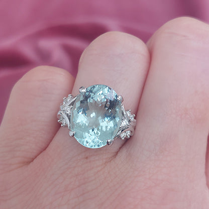 8.58ct Oval Aquamarine Solitaire Ring with Decorative Diamond Shoulders
