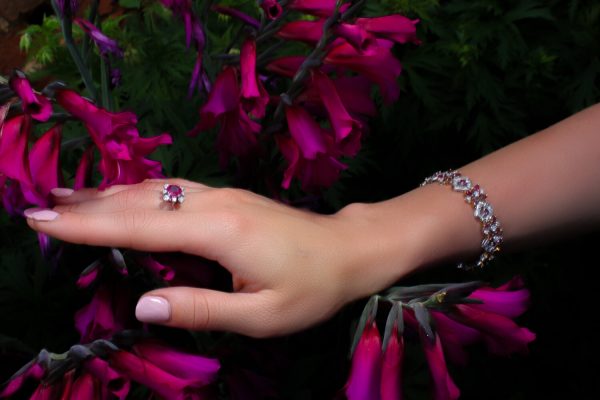 Vintage Thai Ruby and Diamond Bracelet; comprised of 3.52cts mixed-cut Thai rubies and 2.61cts brilliant-cut diamonds in alternating clusters set in 18ct yellow and white gold, Circa 1970s, with GCS certificate