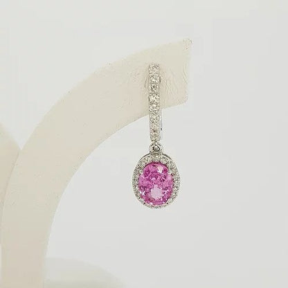 Pink Sapphire and Diamond Oval Cluster Drop Earrings; 2.01cts oval faceted pink sapphires surrounded by diamonds, diamond set drop, in 18ct white gold