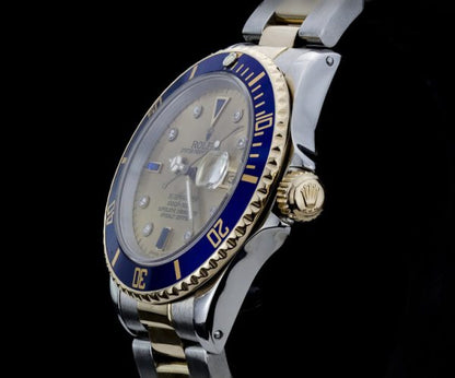 Rolex 16803 Submariner in Gold and Steel with Tropical Serti Dial