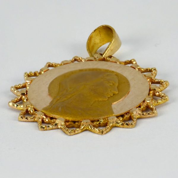 French Virgin Mary 18ct Gold Pendant by Dropsy; 18ct yellow gold pendant designed as a round medal depicting the Virgin Mary on a sunburst ground, Signed E Dropsy