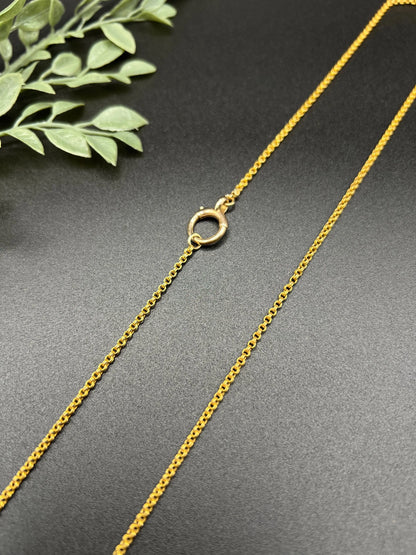 A yellow gold rolo link chain necklace