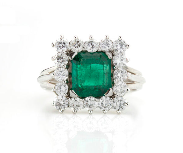 1.43 Natural Colombian Emerald and Diamond Square Cluster Ring; 1.43ct octagonal-cut emerald surrounded by 1.12cts diamonds, in 18ct white gold, with GCS Certificate