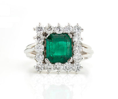 1.43 Natural Colombian Emerald and Diamond Square Cluster Ring; 1.43ct octagonal-cut emerald surrounded by 1.12cts diamonds, in 18ct white gold, with GCS Certificate