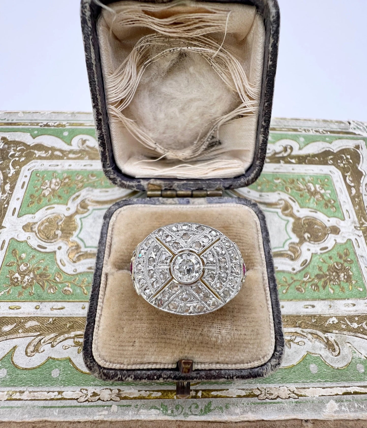 Antique 18 Carat Gold, Platinum, Diamond and Ruby Bombé Ring, Circa 1910