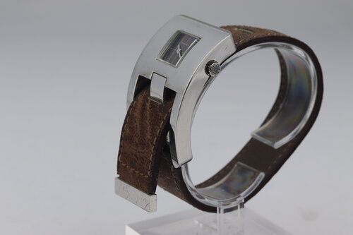 Longines Rare Vintage Sterling Silver Watch by Serge Manzon; the curved 34 x 50mm solid silver case with black dial, mechanical movement