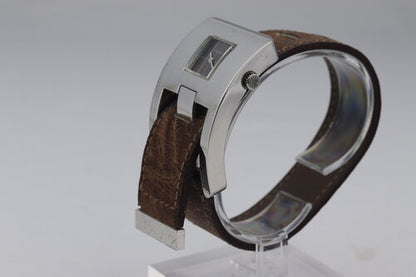 Longines Rare Vintage Sterling Silver Watch by Serge Manzon; the curved 34 x 50mm solid silver case with black dial, mechanical movement