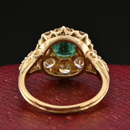 Vintage 1.30ct Colombian Emerald and 1.60ct Diamond Cluster Engagement Ring in 18ct Yellow Gold