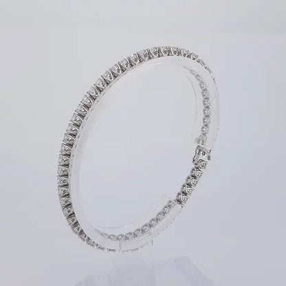Diamond Line Bracelet in 18ct White Gold; featuring 6.22 carats of round brilliant-cut diamonds, each claw-set and mounted in 18ct white gold