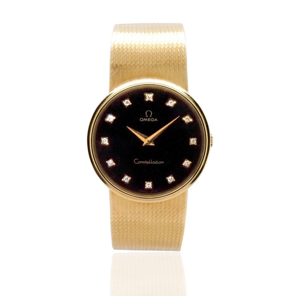 Vintage 1970s Omega Constellation 18ct Gold Watch with Diamond Dial, 18ct yellow gold case features black dial with diamond dot hour markers on an 18ct yellow gold bracelet strap