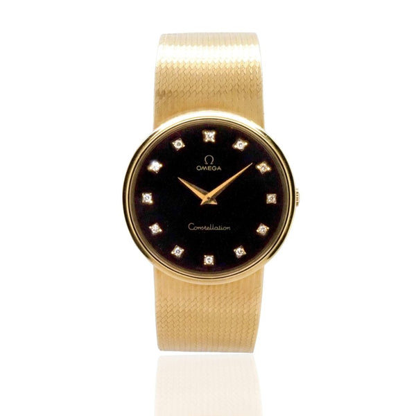 Vintage 1970s Omega Constellation 18ct Gold Watch with Diamond Dial, 18ct yellow gold case features black dial with diamond dot hour markers on an 18ct yellow gold bracelet strap