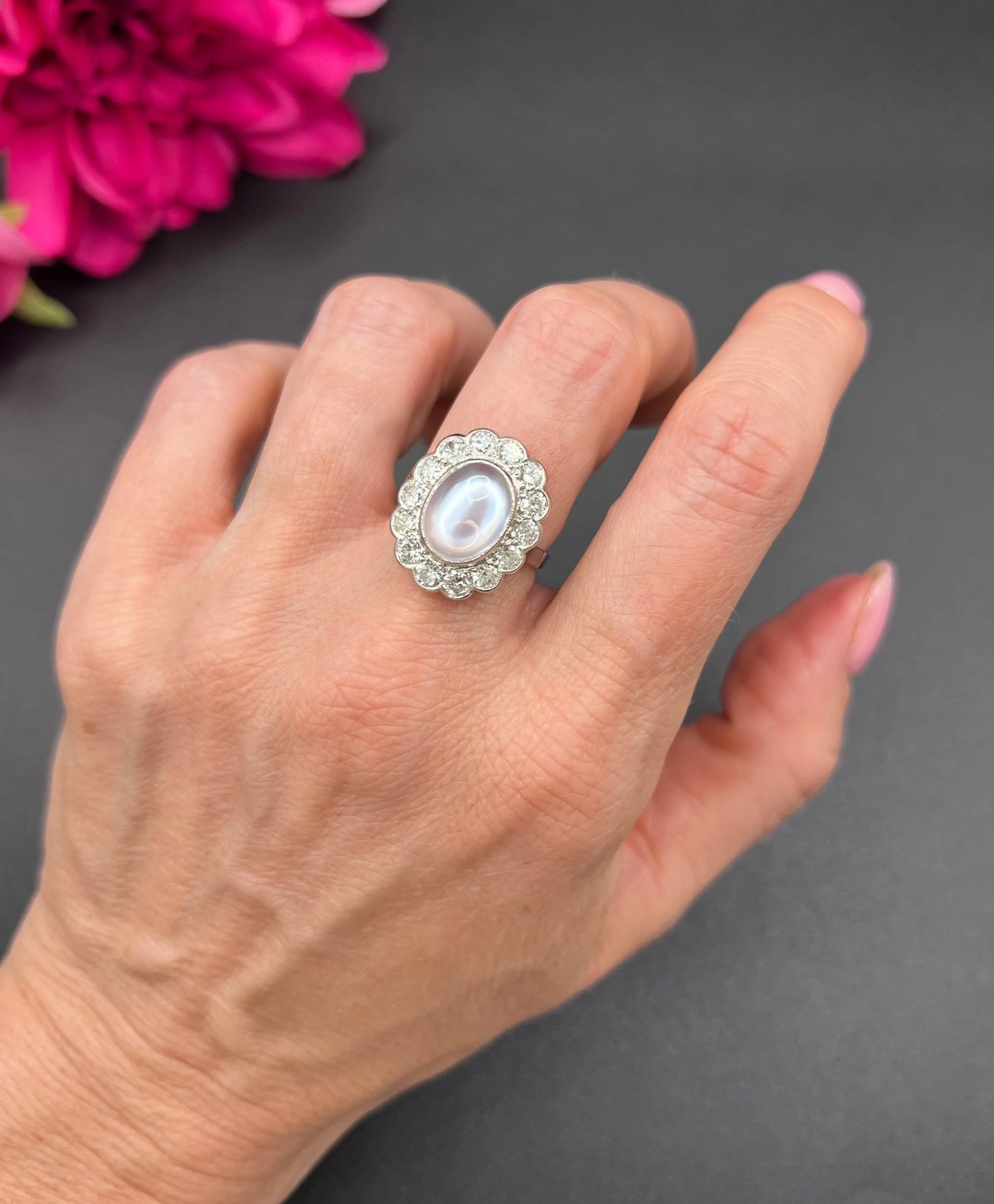 Antique French Platinum Cabochon Moonstone and Diamond Cluster Ring, Circa 1920