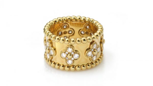 Vintage Van Cleef and Arpels Perlee Clover Floral Diamond Band Ring; crafted from 18ct yellow gold and set with 1.40 carats round brilliant-cut diamonds in a floral design. Circa 1990s