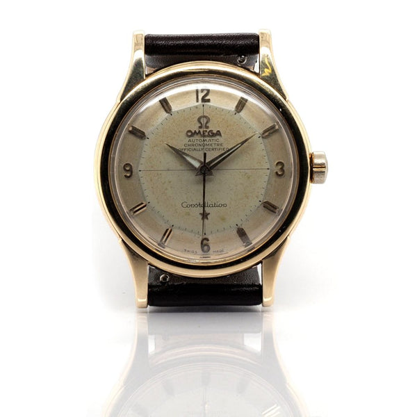 Vintage 1950s Omega Pie Pan Constellation 14ct Gold Automatic Watch, distinctive champagne-coloured pie pan dial on a black leather strap