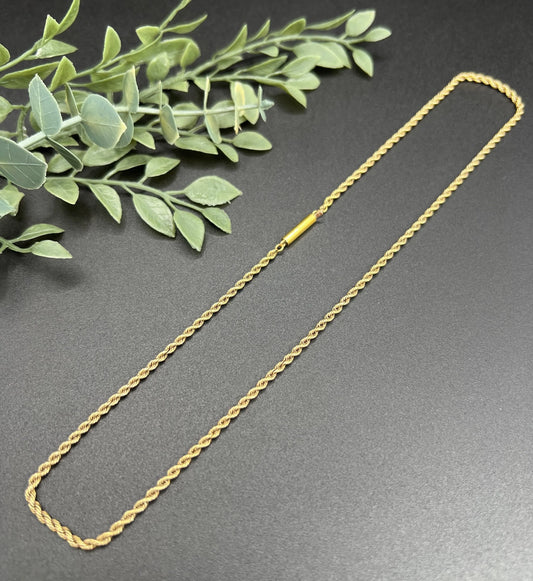 A yellow gold rope chain necklace