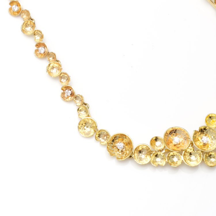 Vintage 18ct Yellow Gold Floral Necklace with Diamonds; comprised of circular hammered gold flowers set with 0.91cts brilliant-cut diamonds