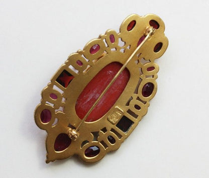 Neo Renaissance Style Pearl and Garnet set Cameo Brooch; 19thC cameo surrounded by later small pearls and garnets, 18ct gold, Circa 1980.