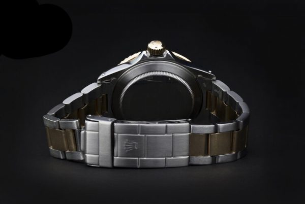 Rolex 16803 Submariner in Gold and Steel with Tropical Serti Dial