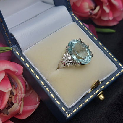 8.58ct Oval Aquamarine Solitaire Ring with Decorative Diamond Shoulders