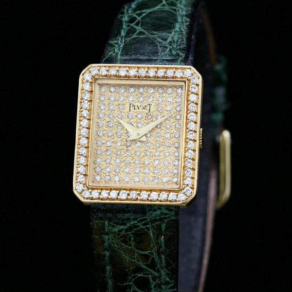 Piaget Ladies Custom Diamond Dial and Bezel 18ct Gold Manual 20" Watch; Model Number 41545, with original box and service document, Circa 1990s
