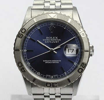 Rolex Datejust Turn-O-Graph 16264 Stainless Steel Watch; 36 mm case, blue dial, quick-set magnified date, white gold rotating bezel, screw down crown and sapphire crystal, automatic movement, Jubilee bracelet