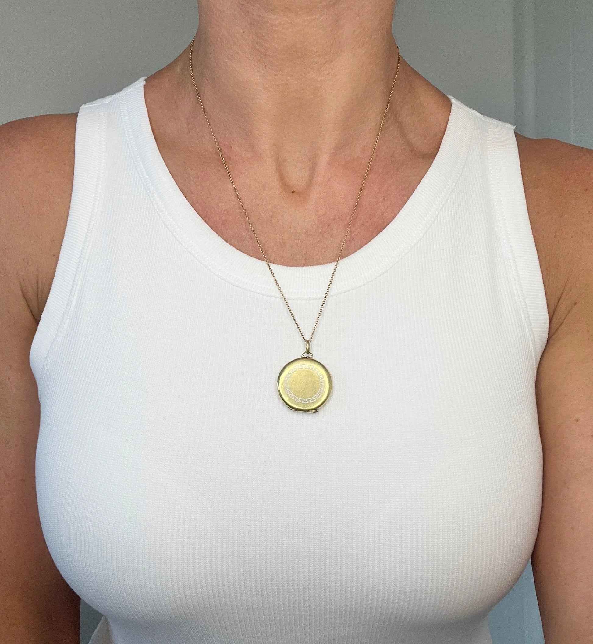 Antique 15ct Yellow Gold, Edwardian era Greek Key White Enamel Round Locket