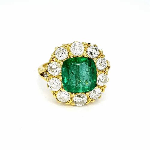 Emerald and Diamond Cluster Ring; central 3.65 carat cushion-cut emerald surrounded by 1.75cts sparkling diamonds, in 18ct yellow gold