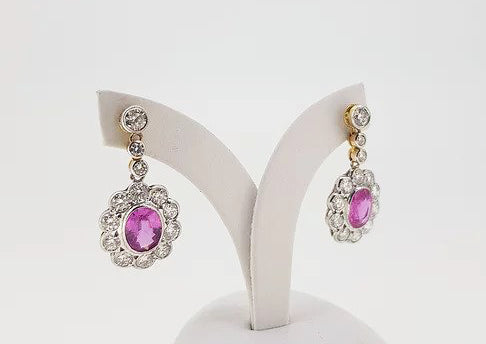 Pink Sapphire and Diamond Oval Cluster Drop Earrings; featuring 2.70cts oval faceted pink sapphires surrounded by 2.51cts diamonds, 18ct gold