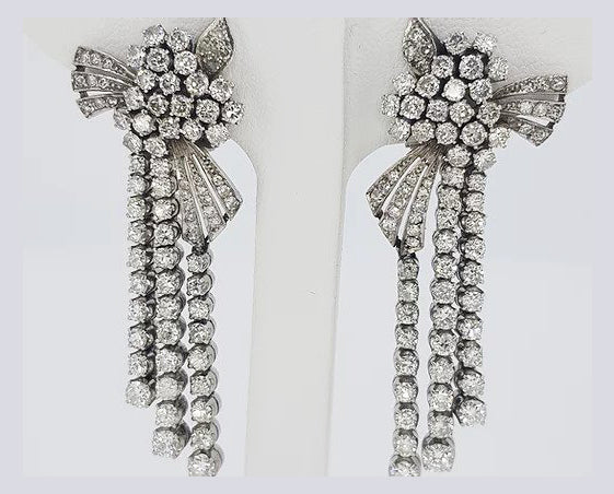 Diamond and Platinum Drop Earrings; 5.00 carat total; brilliant-cut diamond set clusters and drops, a decadent piece, in platinum, estimated 5.00 carats.