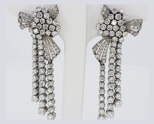 Diamond and Platinum Drop Earrings; 5.00 carat total; brilliant-cut diamond set clusters and drops, a decadent piece, in platinum, estimated 5.00 carats.