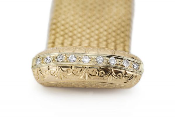 Vintage 18ct Yellow Gold Woven Bracelet, with 0.47ct Brilliant-cut Diamond set Clasp, accented with a tassel fringe, Circa 1970s