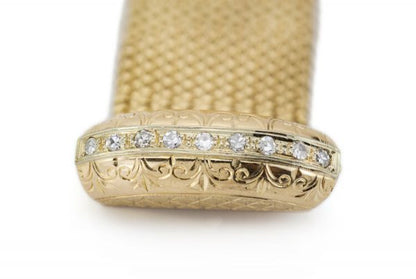 Vintage 18ct Yellow Gold Woven Bracelet, with 0.47ct Brilliant-cut Diamond set Clasp, accented with a tassel fringe, Circa 1970s