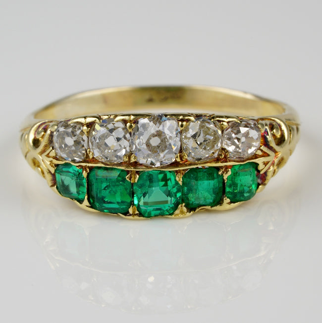 Antique Victorian Colombian Emerald and Old Mine Cut Diamond Double Row Five Stone Ring, Late 19th century, Circa 1870