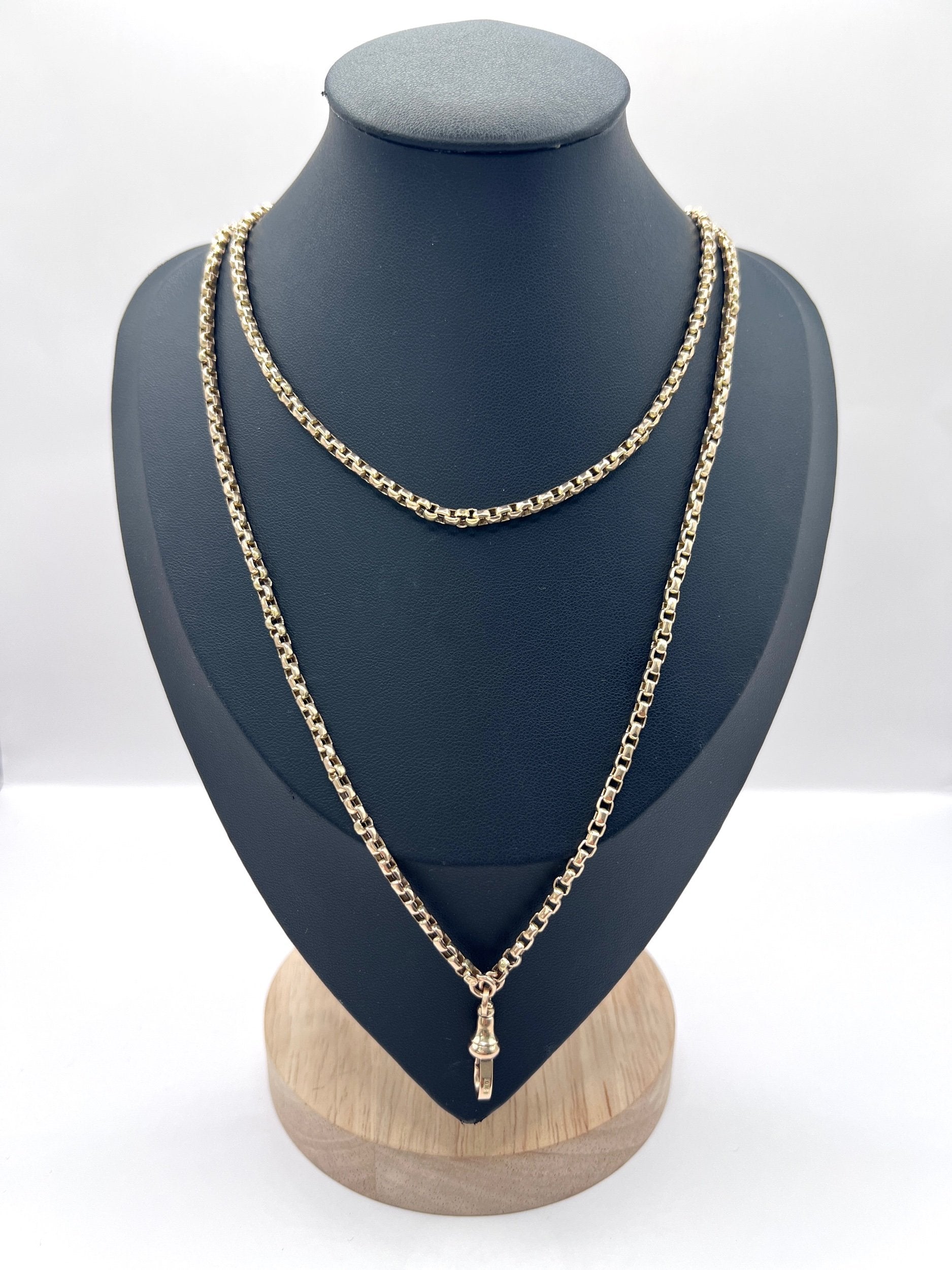 A long rose gold link necklace with swivel clasp