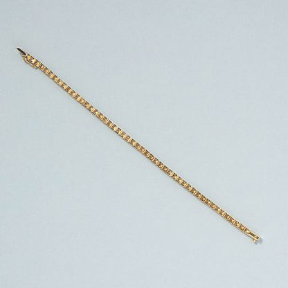 5ct Diamond Line Tennis Bracelet in 18ct Yellow Gold, 50 round brilliant-cut diamonds totalling 5 carats in individual articulated square settings