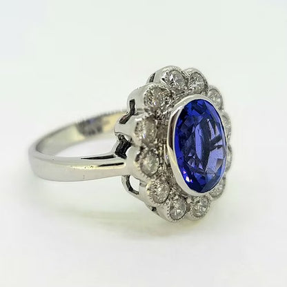 3ct Oval Tanzanite and Diamond Floral Cluster Engagement Ring