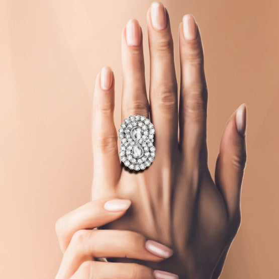 Contemporary Diamond Infinity Cocktail Ring; featuring two central pear-shaped rose-cut diamonds of 1.00 carat each, surrounded by radiant double layered pear rose-cut diamonds to form the Infinity symbol.