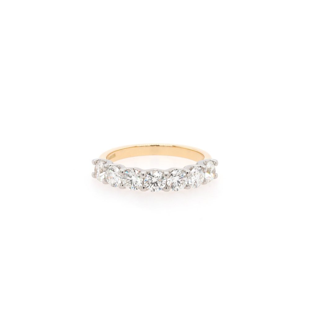 Diamond half eternity ring in gold and platinum.