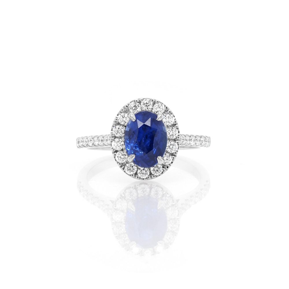 Sapphire and diamond cluster ring in platinum.