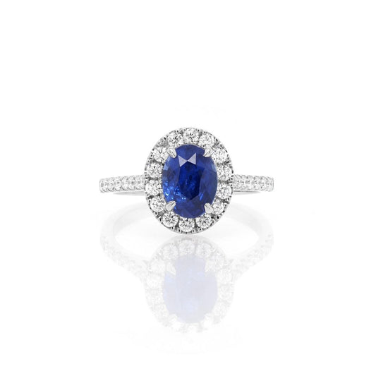 Sapphire and diamond cluster ring in platinum.