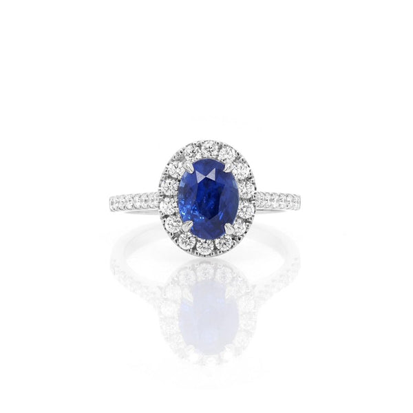 Sapphire and diamond cluster ring in platinum.